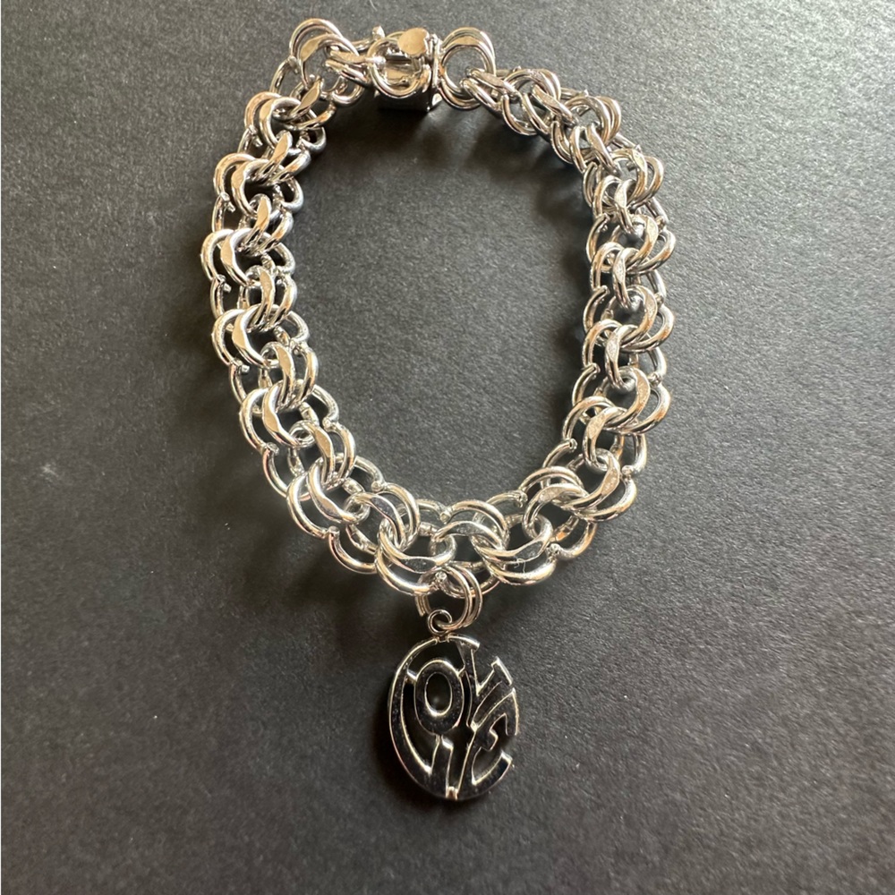 Sterling silver starter charm bracelet, 8”.